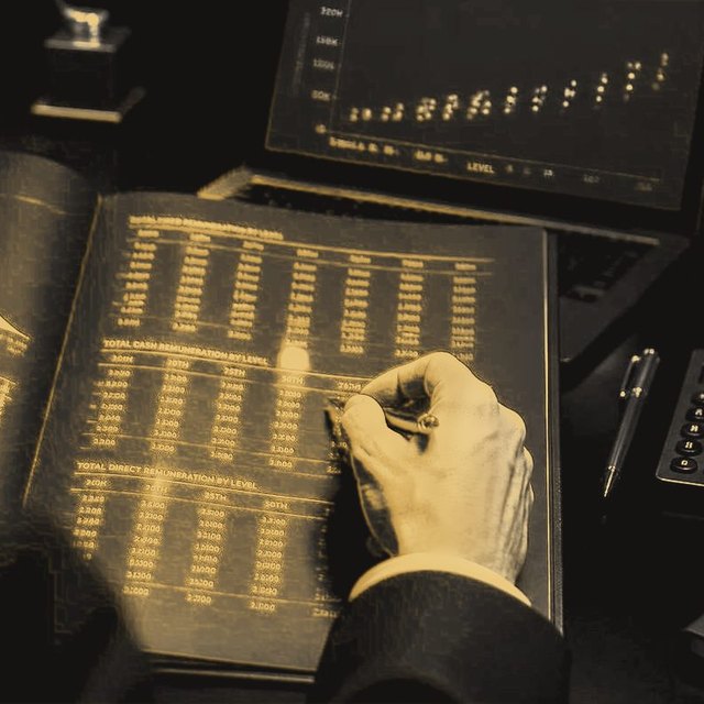 A pay report open on a desk, a bell curve drawn in brass